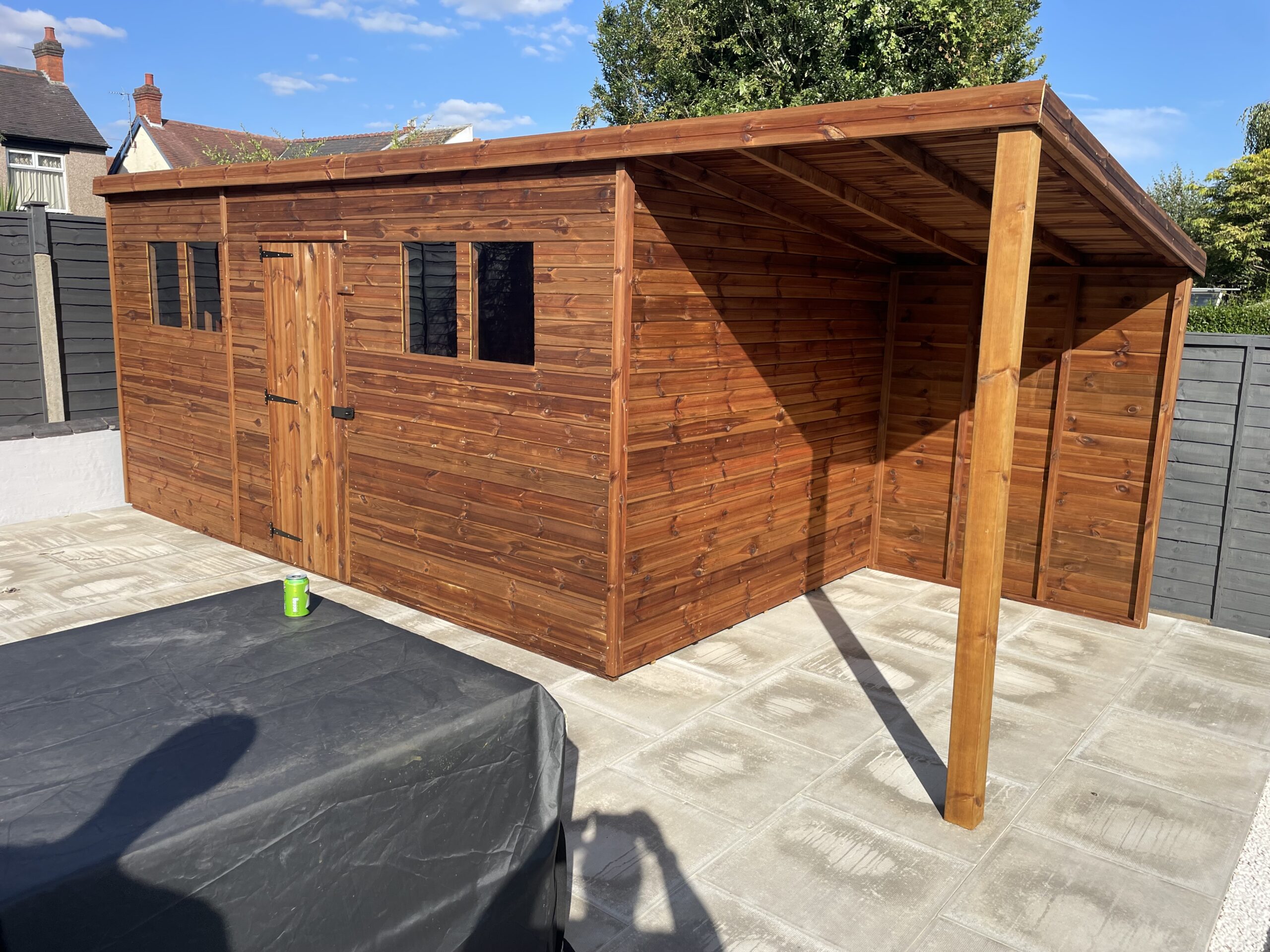 15x8 pent shed with extension and multiple windows - larger sheds benefit from careful slab base levelling