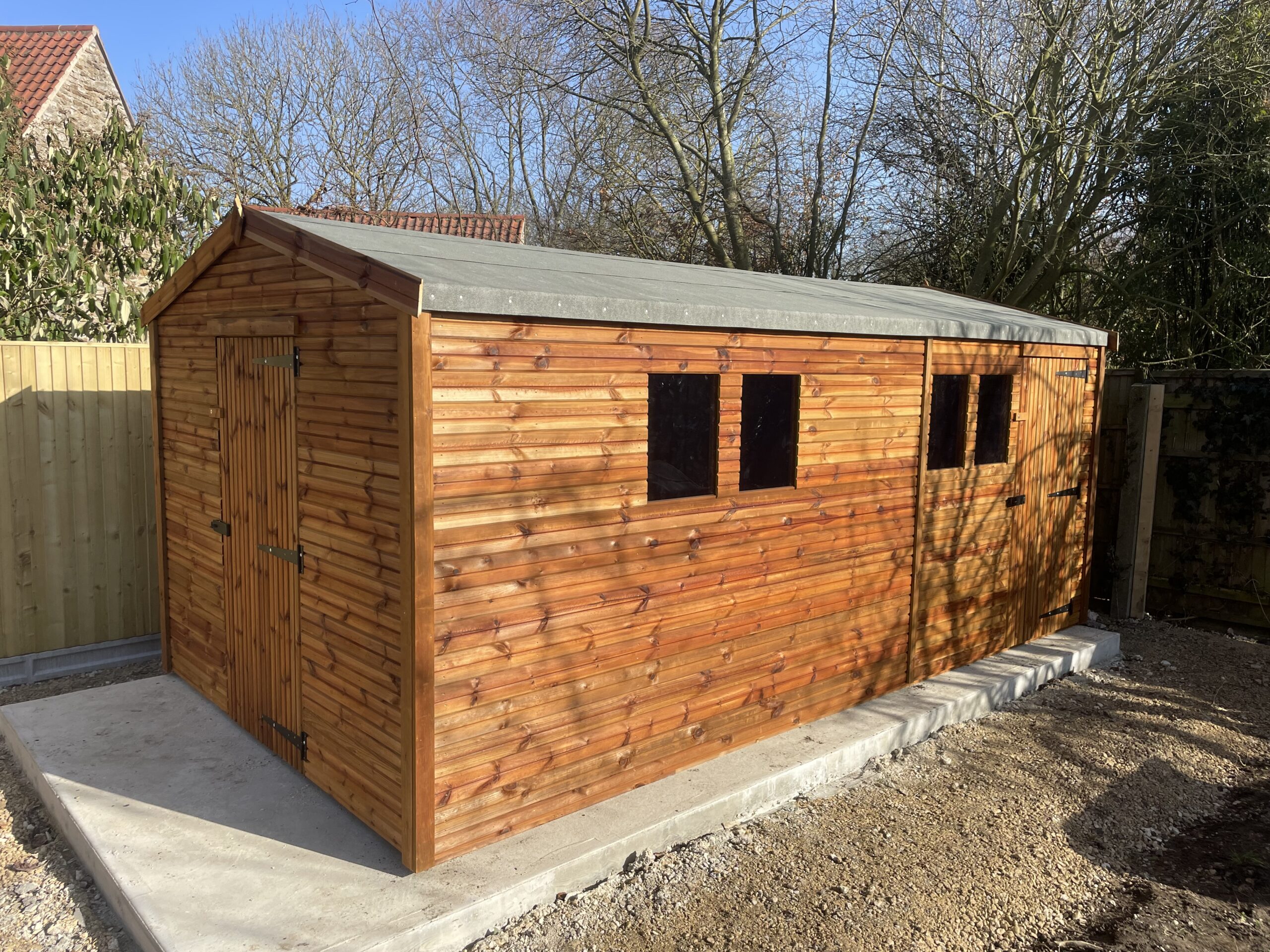 Large apex garden shed in a residential garden