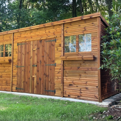 Pent summer shed with four windows and a double door