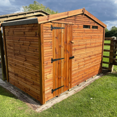 A large security shed with two windows and a single door